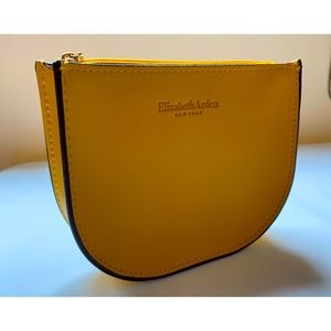 Elizabeth Arden mustard yellow makeup bag
